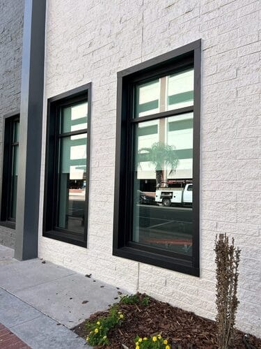Black framed commercial window systems installed by JEM Glass